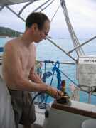 Ken using torch to loosen frozen winch